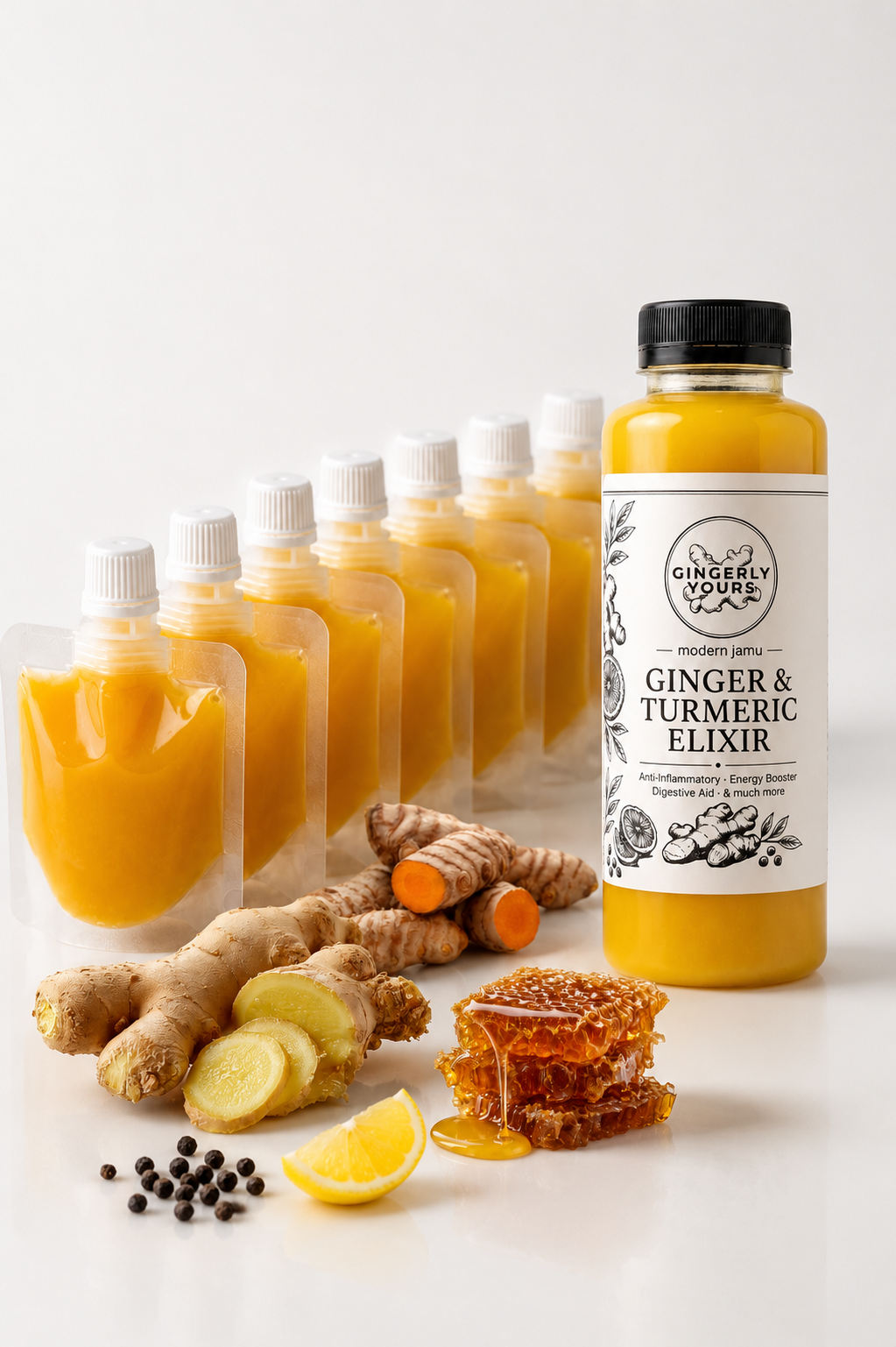 Gingerly Yours ginger and turmeric elixir bottle with seven wellness shot pouches, fresh ginger, turmeric, lemon, honeycomb and black pepper.